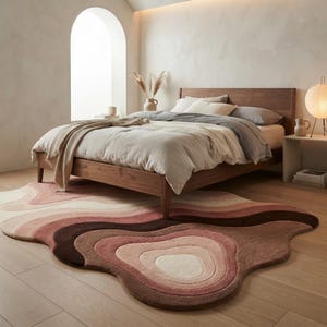 Hand Tufted Abstract Wave Pattern Rug with Organic Curved Layers in Blush Pink, Beige and Brown Tones for Modern Home Decor