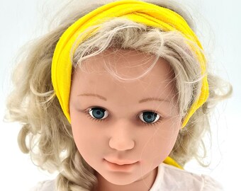 Diadema de muselina 100% algodón (orgánico) color amarillo