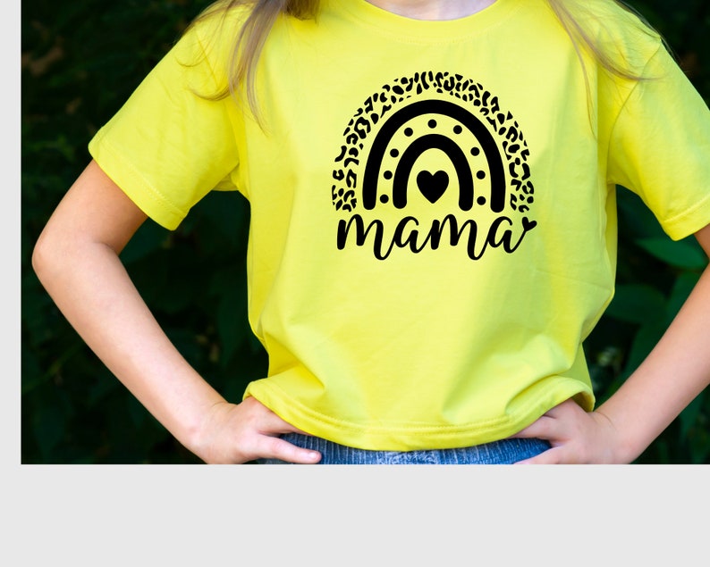 May include: A yellow t-shirt with a black and white leopard print rainbow design and the word "mama" underneath.