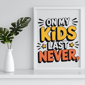 May include: A framed art print with the text "ON MY KIDS LAST NEVER." The text is in a bold, playful font with yellow, orange, and black colors. A white vase with green leaves is on the left.