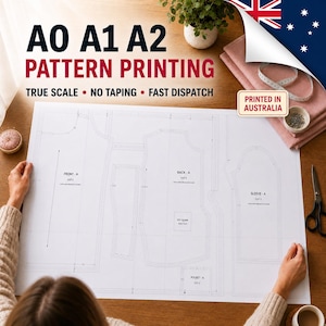 May include: A large white paper sheet featuring black line drawings of sewing patterns for a garment, including front, back, and sleeve sections. The text reads A0 A1 A2 PATTERN PRINTING, TRUE SCALE, NO TAPING, FAST DISPATCH, and PRINTED IN AUSTRALIA.