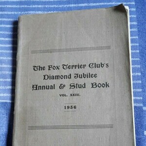 May include: The cover of a tan book titled "The Fox Terrier Club's Diamond Jubilee Annual & Stud Book" with the volume number XXIII and the year 1936.