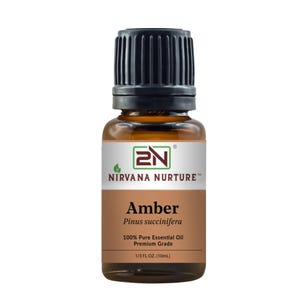 May include: A small amber-colored glass bottle of Nirvana Nurture Amber essential oil. The bottle has a black cap and a white and brown label with the text "Amber" and "100% Pure Essential Oil Premium Grade". The bottle contains 1/3 FL OZ (10mL).
