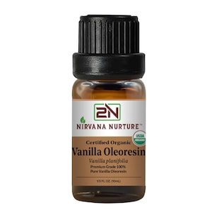 May include: A small glass bottle of Nirvana Nurture Vanilla Oleoresin. The bottle has a black cap and a label with text that reads "Certified Organic Vanilla Oleoresin Vanilla planifolia Premium Grade 100% Pure Vanilla Oleoresin 1/3 FL OZ. (10mL)".