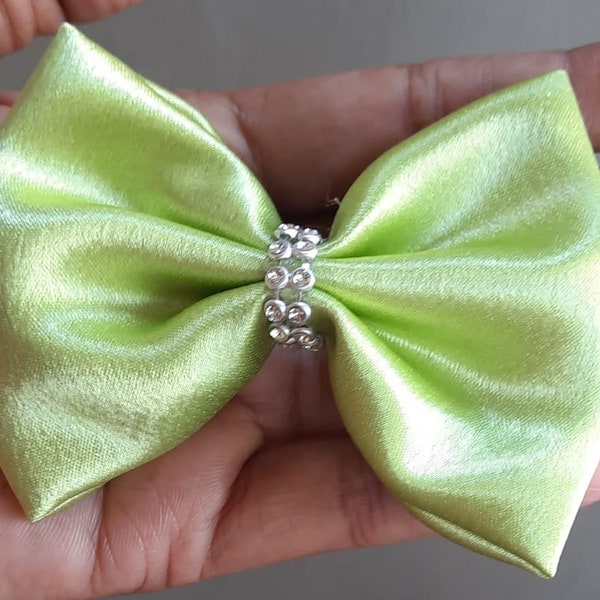 Pista green bow to add magic to your hair and dress