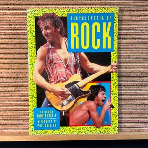 Enciclopedia del Rock, a cura di Tony Russell, introdotta da Phil Collins - Grande libro in brossura illustrato, Peerage Books, edizione rivista 1985