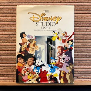 La historia de los estudios Disney de Richard Holliss y Brian Sibley - Primera edición estadounidense, libro ilustrado de tapa dura grande, Crown 1988