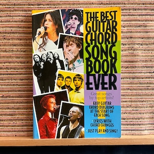The Best Guitar Chord Songbook Ever: Parts 1-4 (full lyrics, chord diagrams, playing guide, 74 hit songs!) - Paperback, Omnibus Press 1999