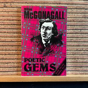 May include: A book cover with a red and white checkered background. The title is "Poetic Gems" by William McGonagall, Poet and tragedian. The cover features a black and white portrait of a man with a mustache and beard. The text "Over 500,000 Copies Sold" is in the bottom right corner.