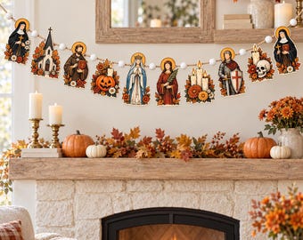 May include: A decorative garland featuring a series of cutouts depicting religious figures, a church, a jack-o'-lantern, and candles, all adorned with autumn leaves and flowers, strung together on a white beaded cord.