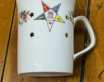 Muy rara taza de café Isabelina de Inglaterra Orden de la Estrella del Este Vintage 1980