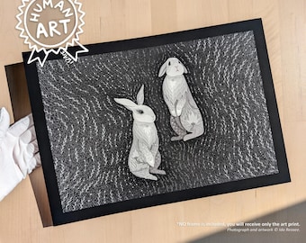 May include: A rectangular art print featuring two white rabbits illustrated with intricate line work against a dense, dark background of swirling white botanical patterns. The print is encased in a simple black border, showcasing a high-contrast design.