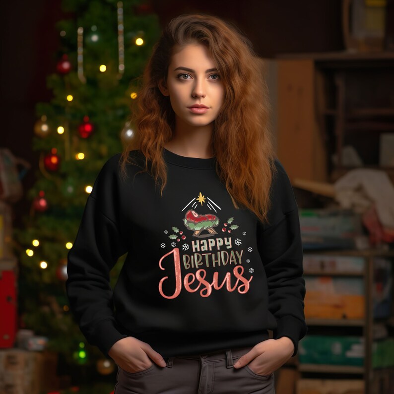 May include: Black sweatshirt with a Christmas nativity scene graphic and the text "Happy Birthday Jesus" in pink.