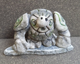 Clay golem figurine, earth spirit