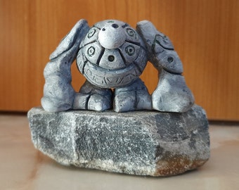 Clay golem figurine, earth spirit