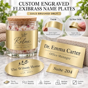 May include: Custom engraved gold brushed Flexibrass name plates in thin and ultra-thin options. Includes a glass jar with bath salts, an oval plate labelled The Wilson Home EST. 2023, a rectangular plate for Dr. Emma Carter, and a small Suite 204 plate.
