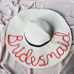 Personalised straw floppy hat with crochet lettering