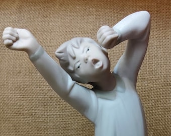 Elegant Lladro figurine "Boy Yawning"