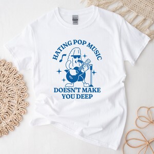 Hassen Pop-Musik macht Sie nicht tief Unisex Schwere Baumwolle T-Shirt Y2K Iconic Lustig It Girl Meme Lustiges grafisches T-Shirt Vintage Cartoon Shirt
