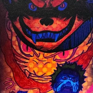 May include: A vibrant illustration featuring a large, menacing demon face with red and black details, sharp teeth, and blue eyes. Below, a blue-skinned figure with green hair and a fierce expression is depicted. The artwork has a comic book style.