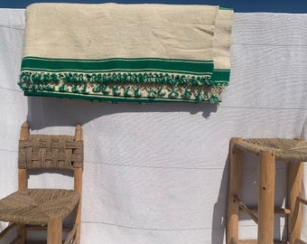 Traditional hand-woven green wool blanket