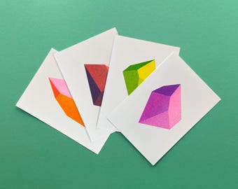 Lot de 4 cartes postales Riso Objets en chute