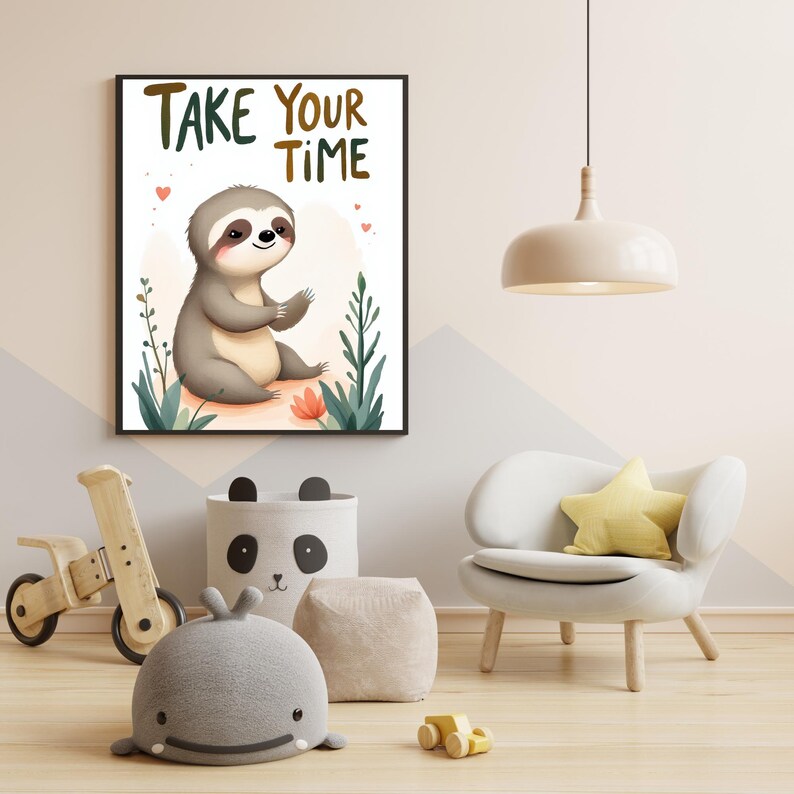 May include: A framed print with a cartoon sloth illustration and the text "TAKE YOUR TIME". The sloth is gray and tan, surrounded by plants and flowers. The print is in a child's room with a wooden toy bike and a panda-themed storage bin.