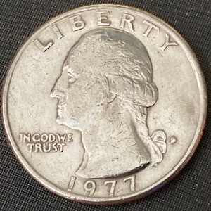 Rare Error Coin: 1977 Filled D Mint Mark Washington Quarter - Unique Piece of US History!