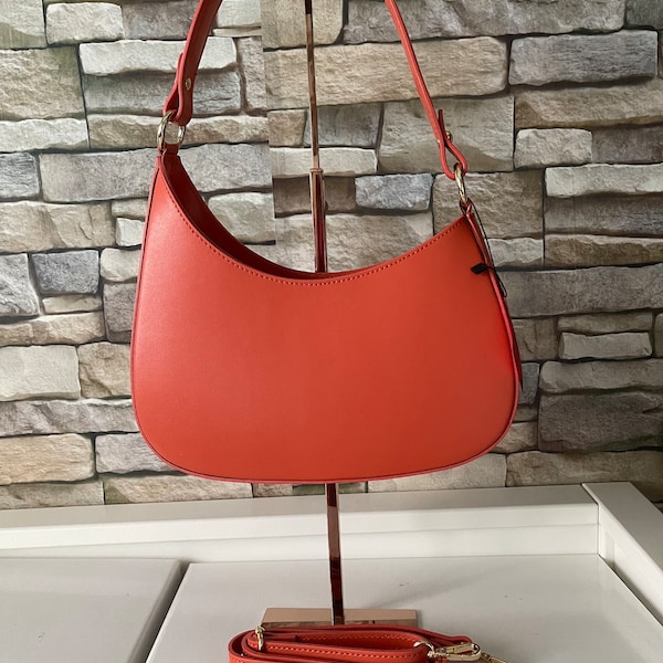 Dark orange genuine leather shoulder bag made in Italy.