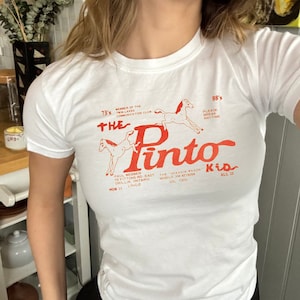 vintage typeface, vintage type tee, retro type tee, graphic baby tee, retro graphic, vintage graphic, faded baby tee, coquette, indie, horses baby tee, retro lounge baby tee
