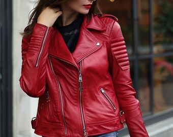 May include: A vibrant red leather jacket with a classic biker style. Features include a notched collar, asymmetrical zipper closure, multiple zippered pockets, and quilted shoulder detailing. The jacket has silver hardware and a tailored fit.