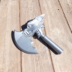 Collapsing dragon axe for cosplay. Dragon themed axe with extending handle.