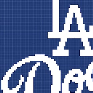May include: White pixelated text on a blue grid background. The text reads "LA Dodgers" in a stylized font, with the "LA" stacked above "Dodgers". The design is reminiscent of a digital or cross-stitch pattern.