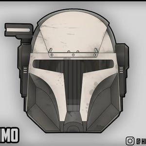 May include: A detailed illustration of a Mandalorian helmet in grey and off-white. The helmet has a T-shaped visor and a side-mounted rangefinder. The word "ANMO" is at the bottom left.