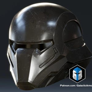 May include: A black, futuristic helmet with a glossy finish and visible scratches. The helmet features a visor and angular design elements, suggesting a sci-fi or cosplay theme. The logo for Galactic Armory is visible.