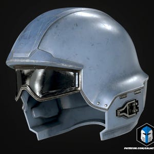 May include: A light blue, futuristic helmet with a dark visor. The helmet has a smooth, metallic finish with visible rivets and mechanical details. The bottom right corner features a logo and the text "PATREON.COM/GALACTICARMORY".