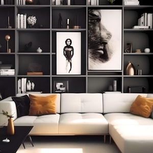 May include: A white sectional sofa with two orange throw pillows in a living room with a large bookshelf behind it. The bookshelf is filled with books, decorative objects, and two black and white framed pictures.