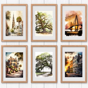 May include: Six framed watercolor paintings of Charleston, South Carolina. The paintings depict a church steeple, a large oak tree, a bridge, a historic house, another oak tree, and a row of houses at sunset.