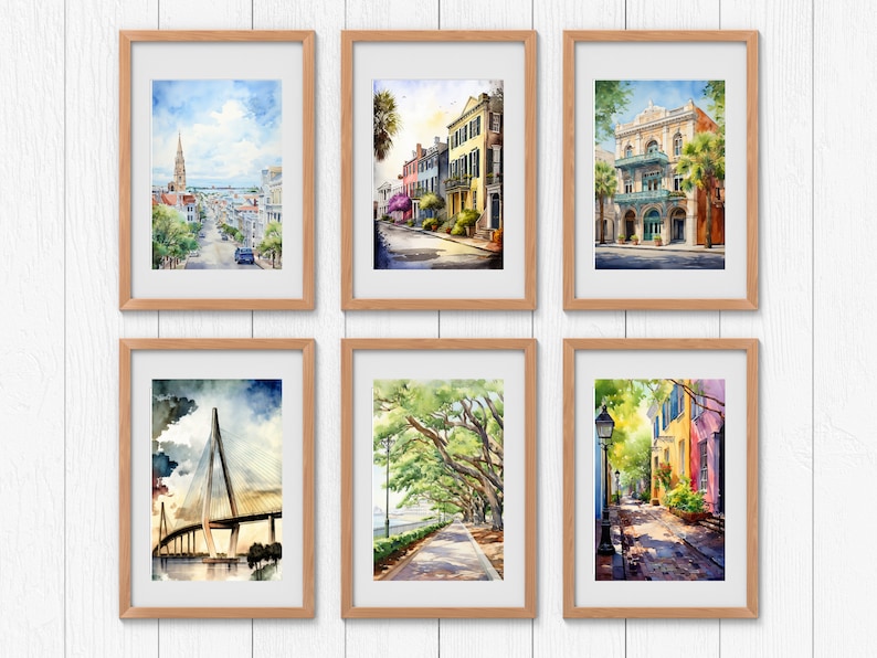 May include: Six framed watercolor paintings of various scenes in Charleston, South Carolina. The paintings depict a street with a church in the distance, a street with colorful houses, a street with a historic building, a bridge over water, a street with trees, and a street with a lamppost.