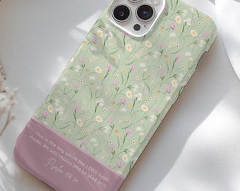 May include: A phone case with a floral pattern in pastel colors. The case has a light green background with small flowers in white, pink, and yellow. The bottom section is a solid mauve color with the text "This is the day which the LORD hath made; We will rejoice and be glad in it. Psalm 118:24."