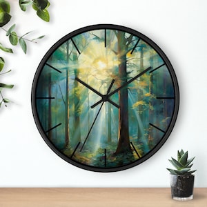 May include: A black wall clock with a forest scene featuring sunbeams shining through the trees. The clock face has black Roman numeral hour markers and black hands.