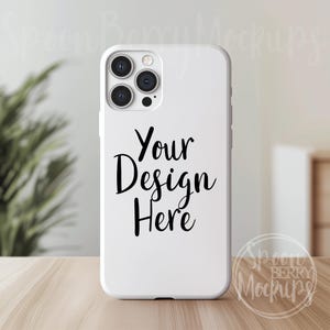 May include: White phone case mockup with a black camera lens and the text "Your Design Here" printed on the back.