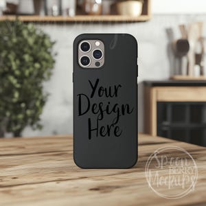 May include: Black phone case with a camera lens and the text "Your Design Here" printed on the back.