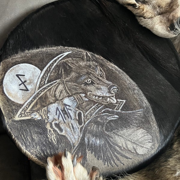 Shaman's drum with painting based on Sami shaman's drums. Hand-painted and is a replica of real museum tambourines of the Sami people.