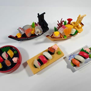 1 Lobster sashimi boat 
2 Luxurious sea bream sashimi boat 
3 Sushi in a wooden tub
4 Sushi on a wooden stand
5 Edo-style sushi