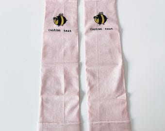 Gepersonaliseerde kinderarmmouwen: op maat gemaakte sportmouwen met UV-bescherming