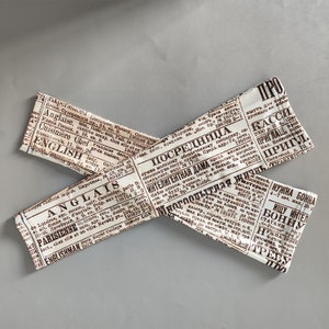 Newspaper Print Arm Sleeves: UV Protection for Cycling, Gardening