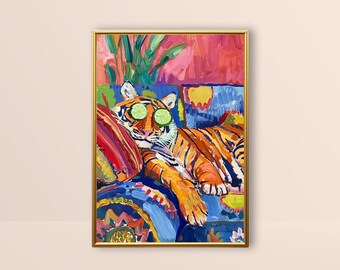 May include: A colorful painting of a tiger wearing cucumber slices over its eyes, relaxing on a blue and red patterned couch. The tiger is orange and black with white stripes. The background is a vibrant pink and green.