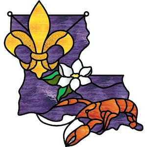 May include: Stained glass art piece depicting the outline of Louisiana in purple, with a gold fleur-de-lis, a white flower, and an orange crawfish. The design has black outlines and two small hanging loops.