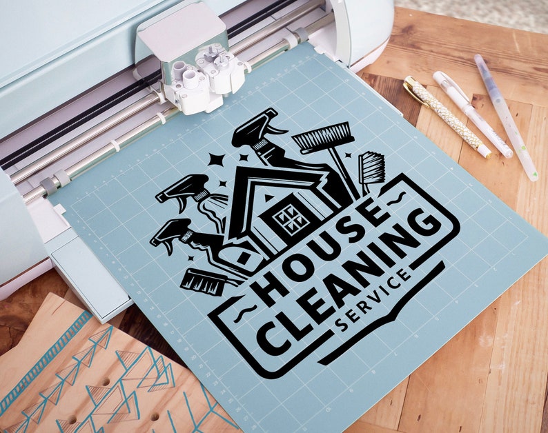 May include: A black and white graphic design of a house with cleaning supplies, including a broom, spray bottles, and a sponge. The text "HOUSE CLEANING SERVICE" is written in a bold, stylized font.